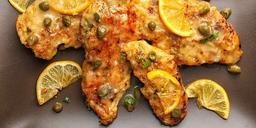 Piccata med citron och kapris serveras med Soave Classico